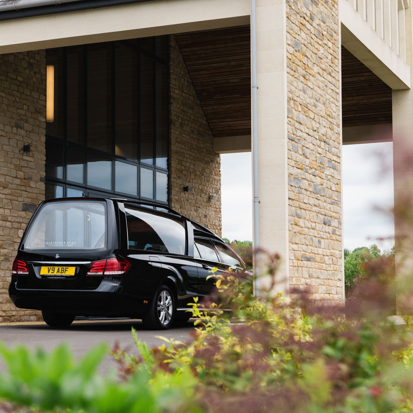 Hearse outside funeral building